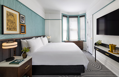The Algonquin Hotel, Autograph Collection, in New York City announced the completion of its property-wide renovation on September 8. The renovation encompassed the hotel’s guest rooms, elevators and corridors. “The Algonquin Hotel has long served as a safe haven for wild minds, a quiet place along Club Row in the center of the wonderful whirlwind that is New York City,” said Willis Loughhead, General Manager of The Algonquin. “Our focus was to honor the past without being beholden to it; timeless rooms were built where creativity can be sparked, and our landmark charm will be enlivened.” The renovation was led by design firm CRÉME, who “leaned into the intimacy and scale of the guestrooms” in the historic building. As part of the design details, rooms are completed with oversized luggage-tag-inspired room signage featuring 181 “individually curated quotes from legends who created or influenced the hotel,” including Kermit the Frog, Maya Angelou, John Leguizamo, and more.